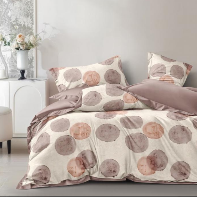 Posteljina sa bež i puder tonovima i apstraktnim kružnim motivima za singl krevet